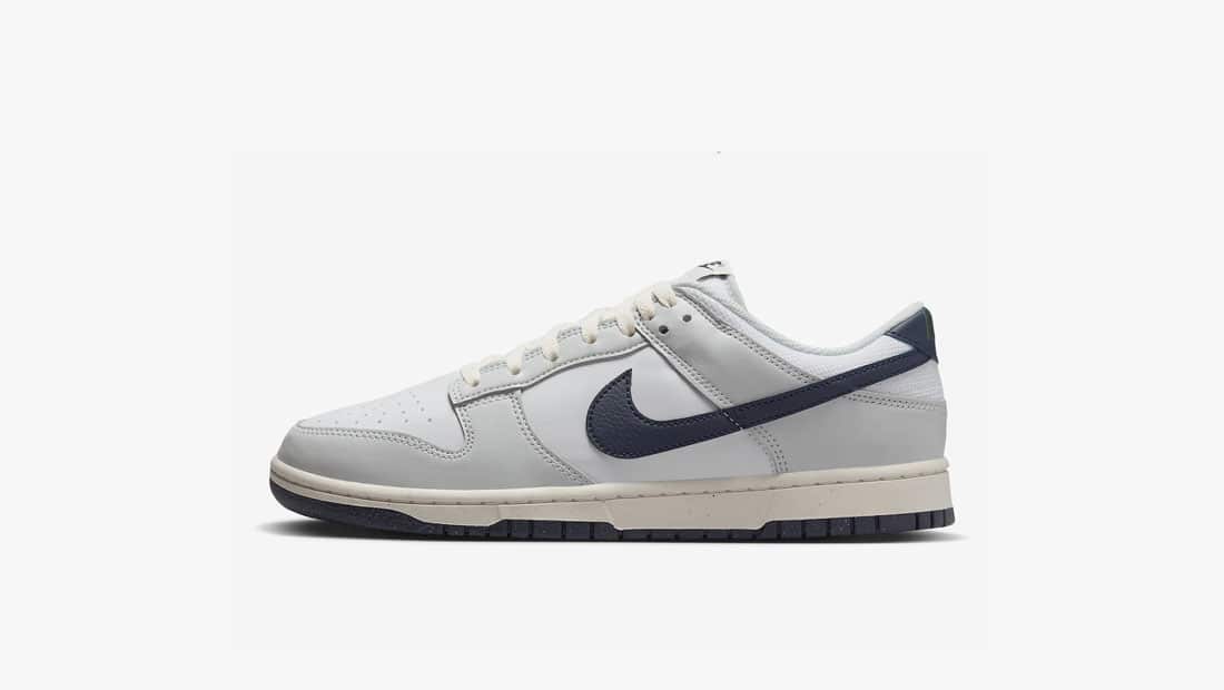 banner nike dunk low next nature photon dust hf4299 001